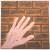 Hand an der Mauer von Jonny B. Good