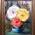 3 Rosen in blauer Vase von